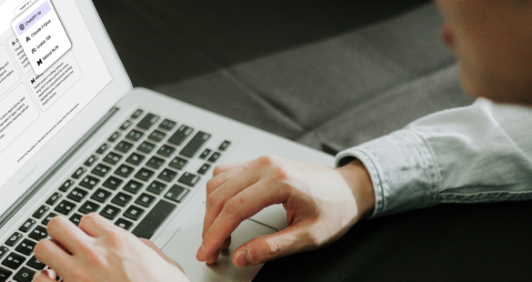 Person using a laptop with AI Chat interface for generating social media content.